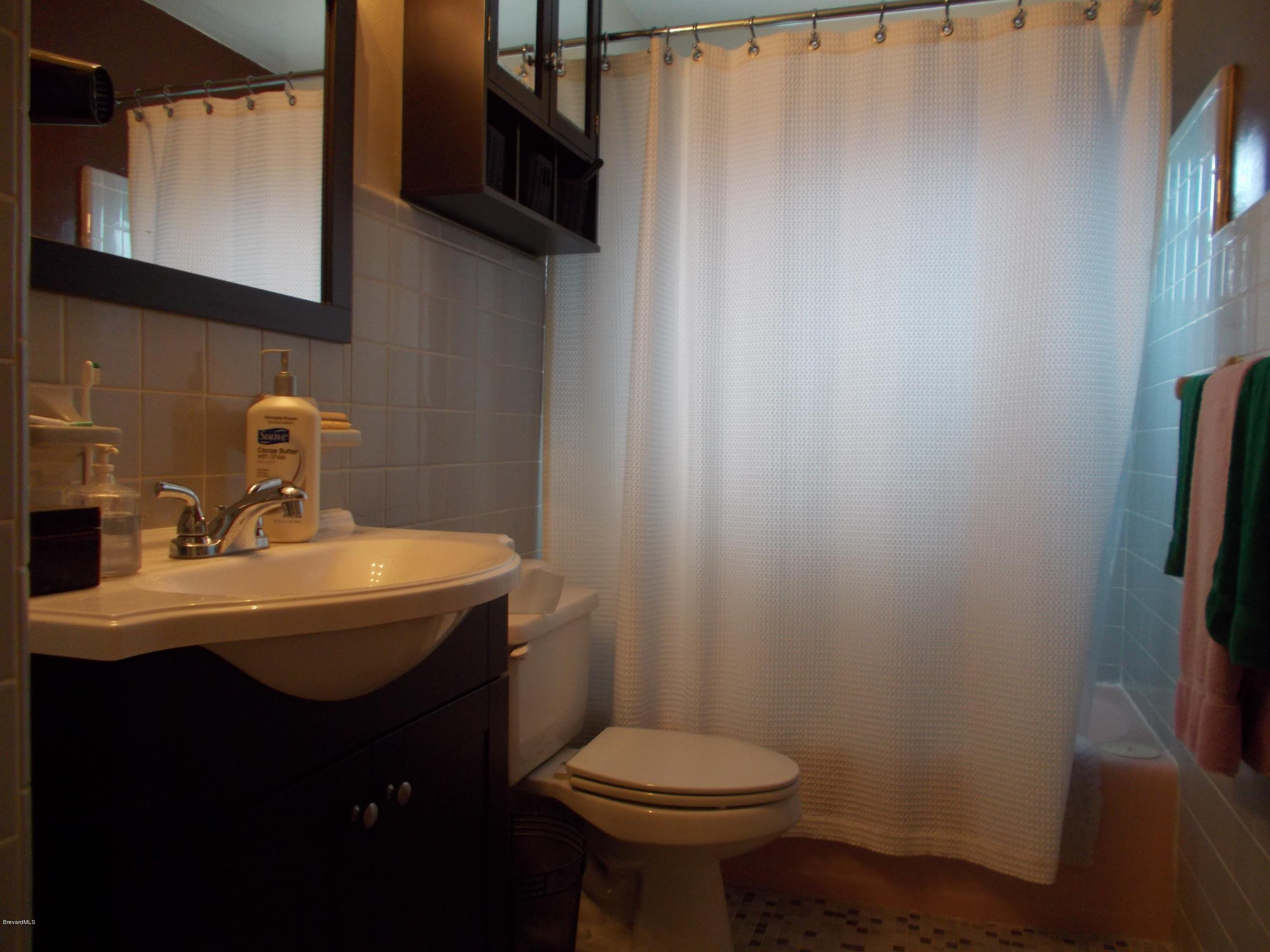 2938 Kosuth Road Northeast Palm Bay, FL 32905 - Photo 8 of 16 REMODELED MASTER BATHROOM