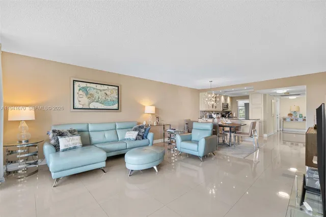 a living room with furniture and a table