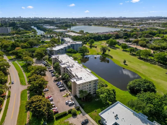a view of a building with a yard