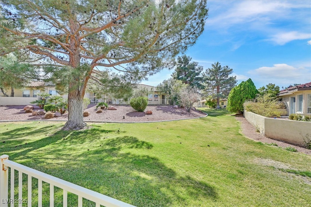 5421 Painted Mirage Road Las Vegas, NV 89149 - Photo 22 of 35 View of yard with fence and a residential view