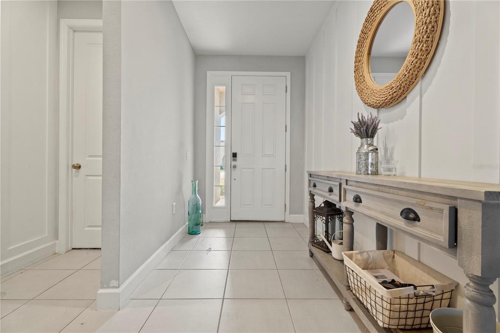 2731 Rialto Court Kissimmee, FL 34746 - Photo 11 of 49 a bathroom with a sink and a mirror