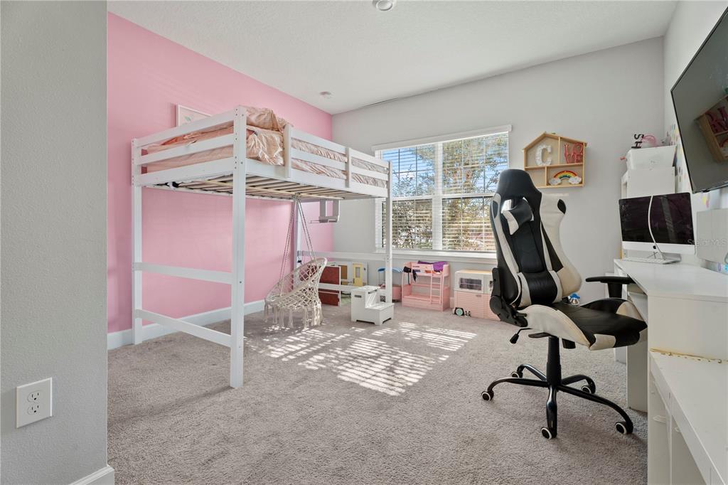 2731 Rialto Court Kissimmee, FL 34746 - Photo 24 of 49 a view of a room with gym equipment