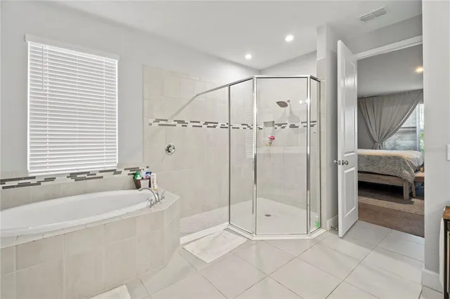 a white toilet sitting next to a shower curtain