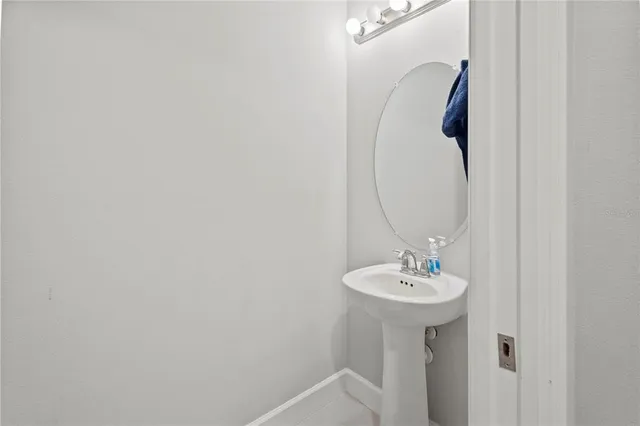 a bedroom with bed and a window