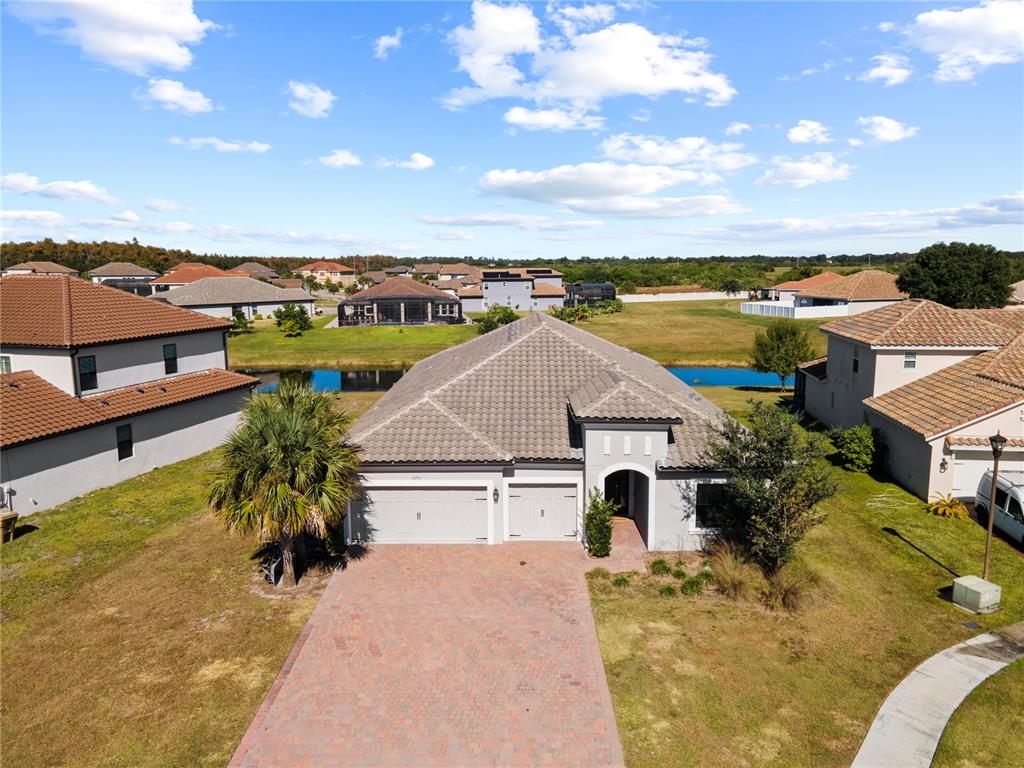 2731 Rialto Court Kissimmee, FL 34746 - Photo 7 of 49 an aerial view of a house with a lake view