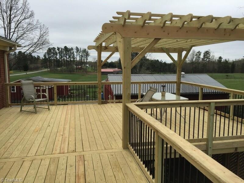 6550 Hunt Road Pleasant Garden, NC 27313 - Photo 4 of 26 NEW DECK overlooking your property