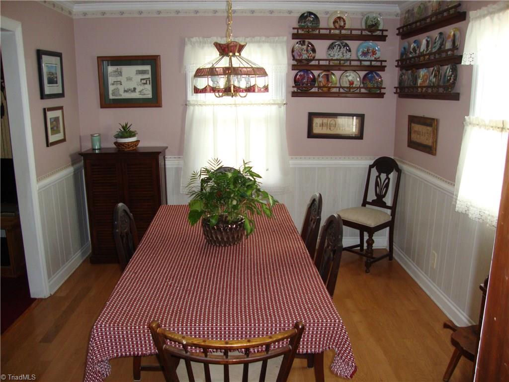 6550 Hunt Road Pleasant Garden, NC 27313 - Photo 7 of 26 Quaint Dining room with hardwood flooring