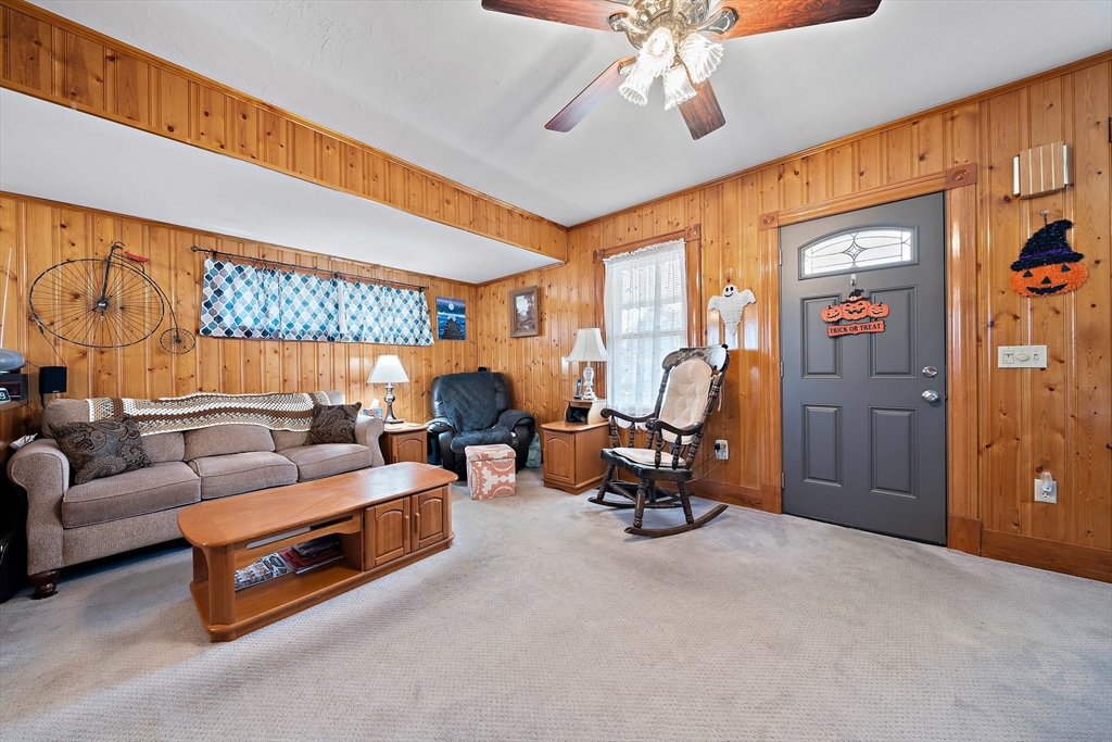 14 Vanness Road Weymouth, MA 02191 - Photo 14 of 27 a living room with furniture a chandelier