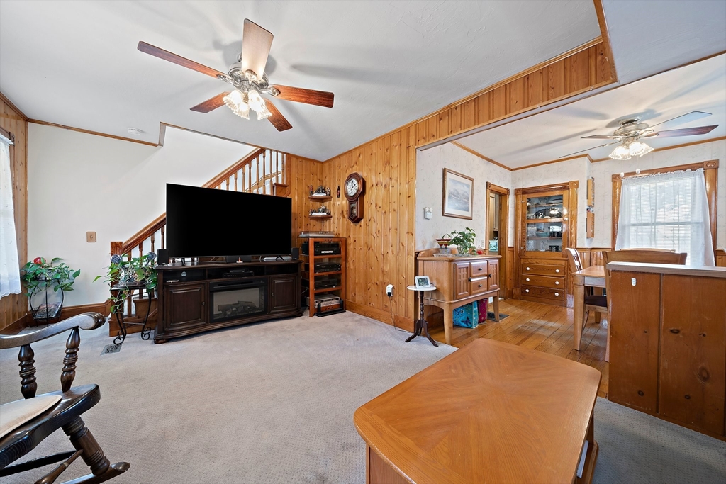 14 Vanness Road Weymouth, MA 02191 - Photo 15 of 27 a living room with furniture and a flat screen tv