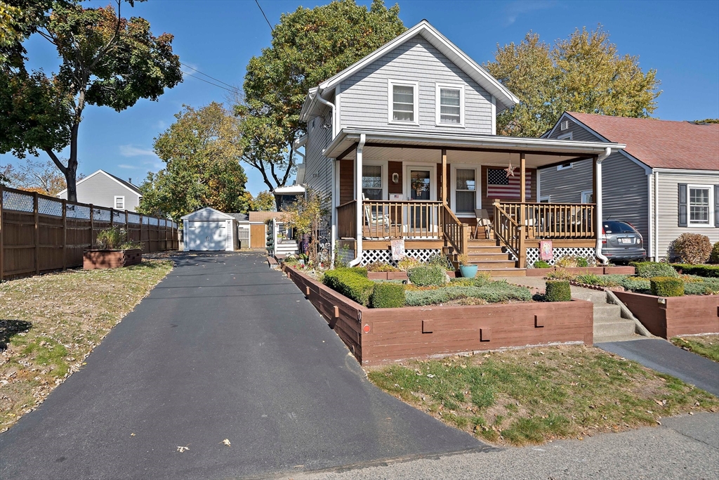 14 Vanness Road Weymouth, MA 02191 - Photo 2 of 27 front view of a house with a yard