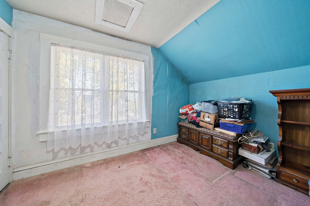 14 Vanness Road Weymouth, MA 02191 - Photo 21 of 27 a living room with furniture and a window