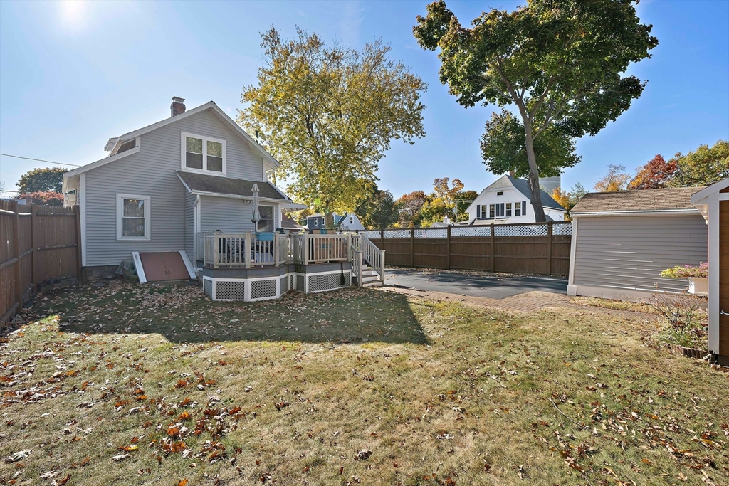 14 Vanness Road Weymouth, MA 02191 - Photo 24 of 27 a front view of a house with a yard and trees