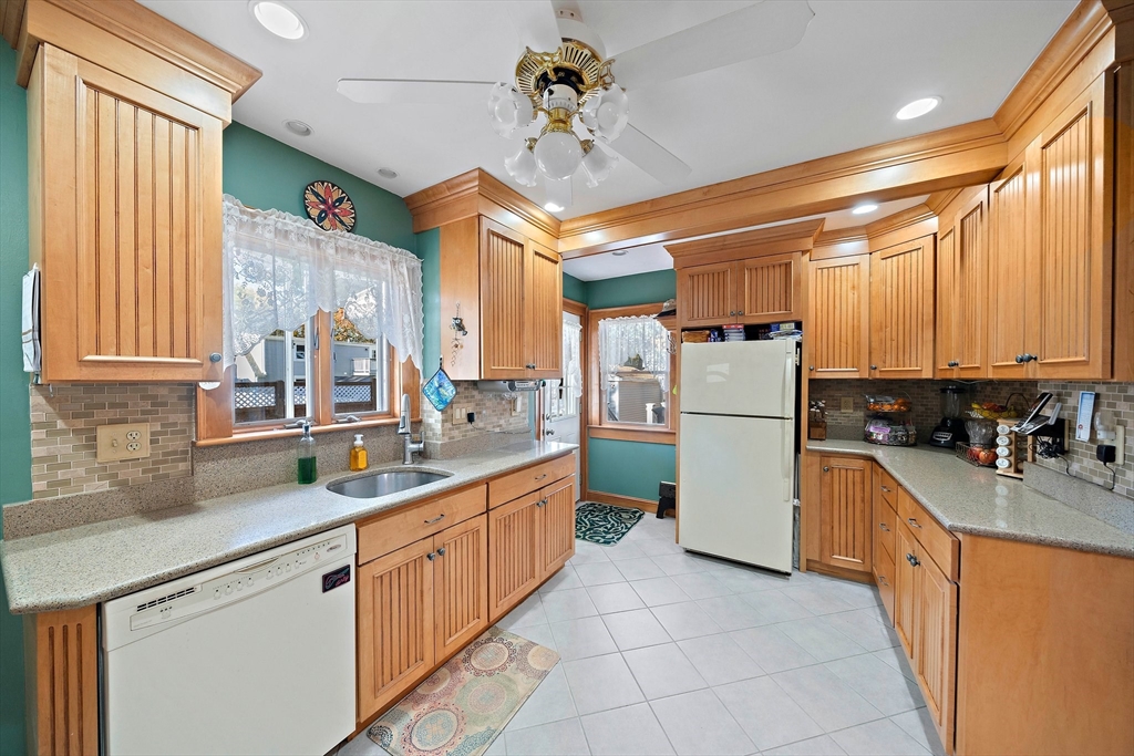 14 Vanness Road Weymouth, MA 02191 - Photo 6 of 27 a kitchen with a sink appliances and cabinets