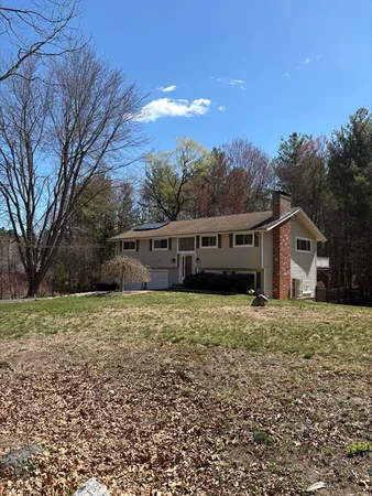 a house view with a garden space