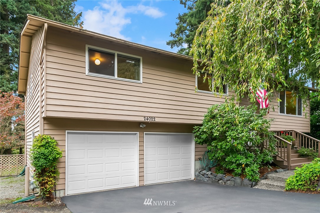 24022 7th Avenue West Bothell, WA 98021 - Photo 2 of 26 a front view of a house with plants