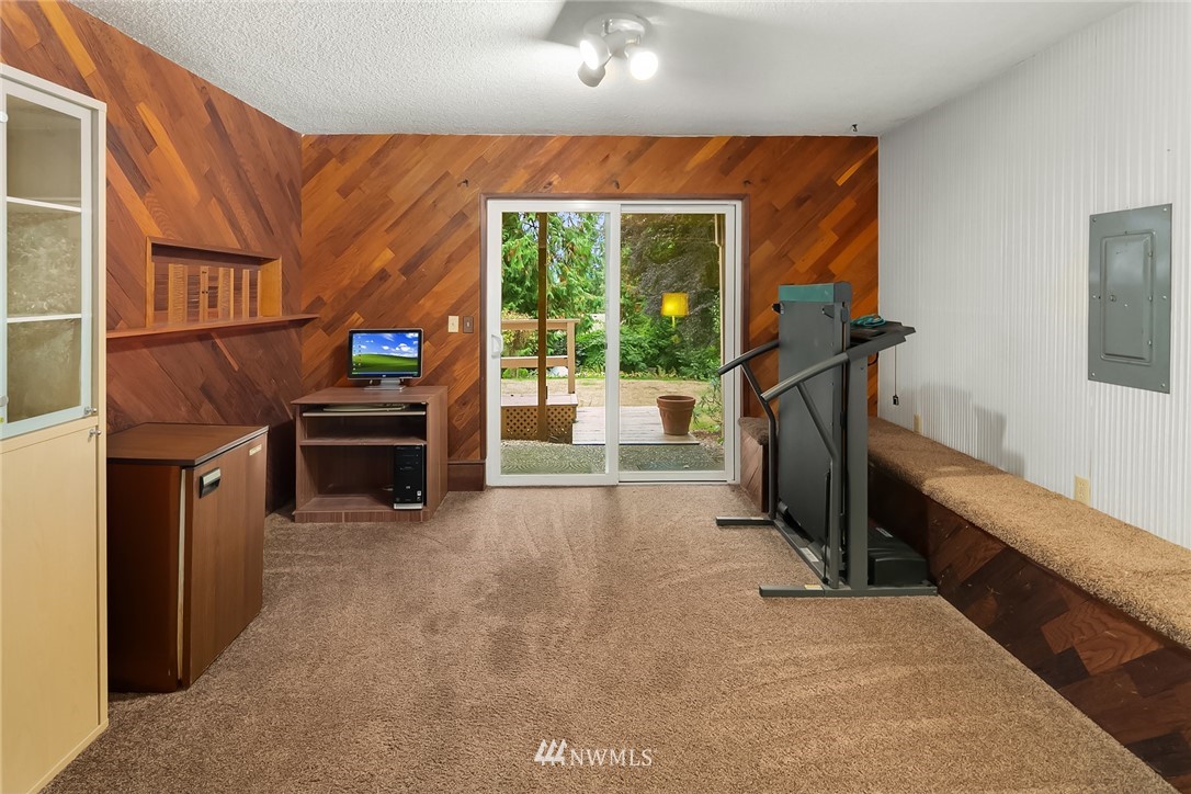 24022 7th Avenue West Bothell, WA 98021 - Photo 16 of 26 a view of a livingroom with furniture and staircase