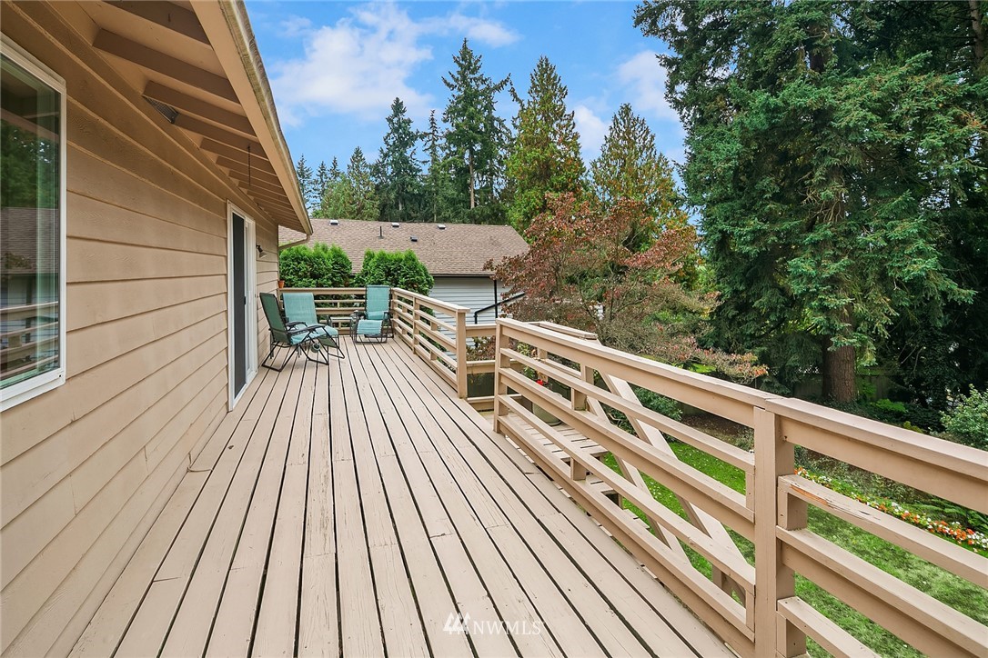 24022 7th Avenue West Bothell, WA 98021 - Photo 20 of 26 a balcony with wooden floor and fence