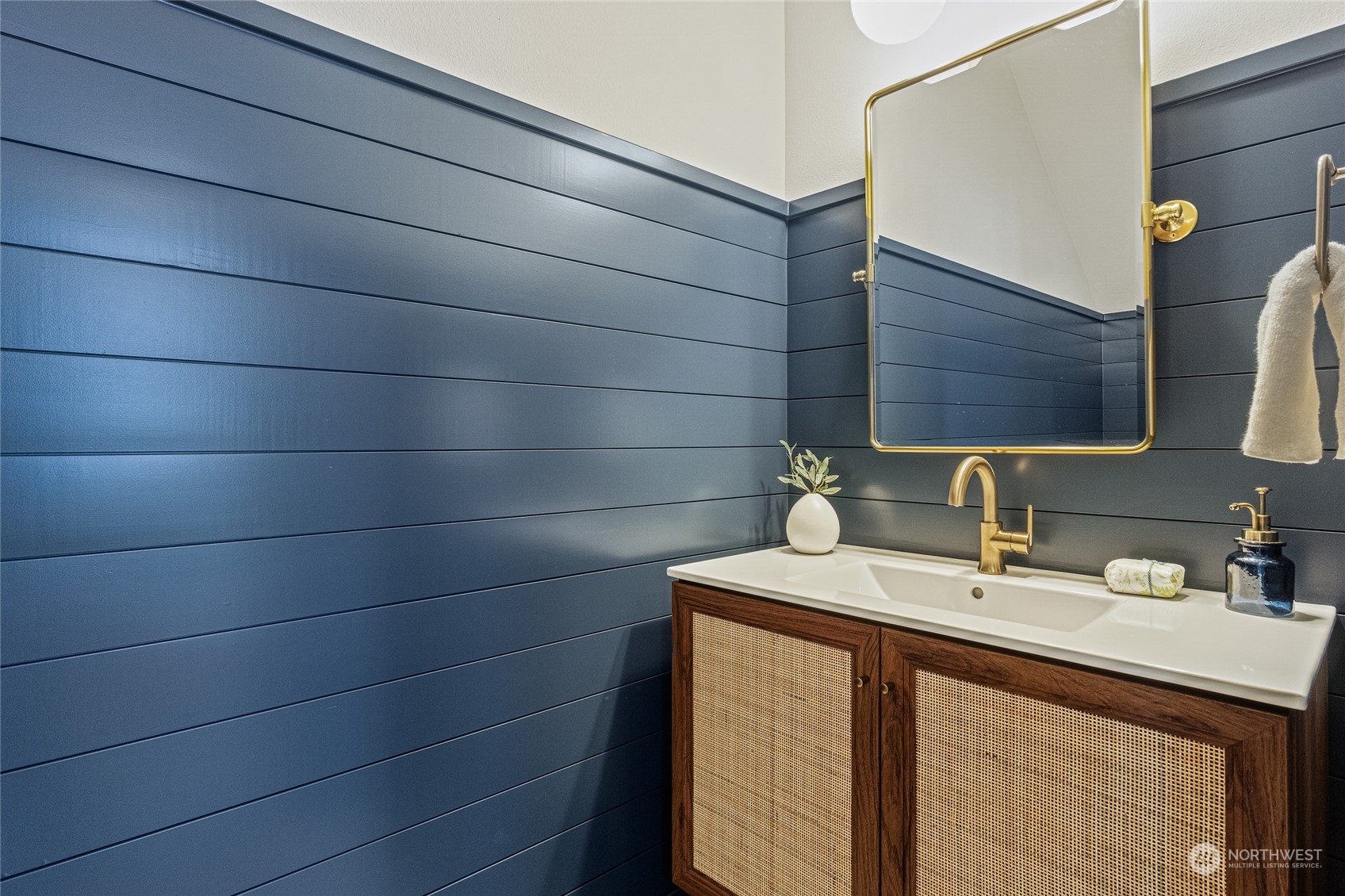 24310 13th Place West Bothell, WA 98021 - Photo 13 of 35 a bathroom with a sink and a mirror