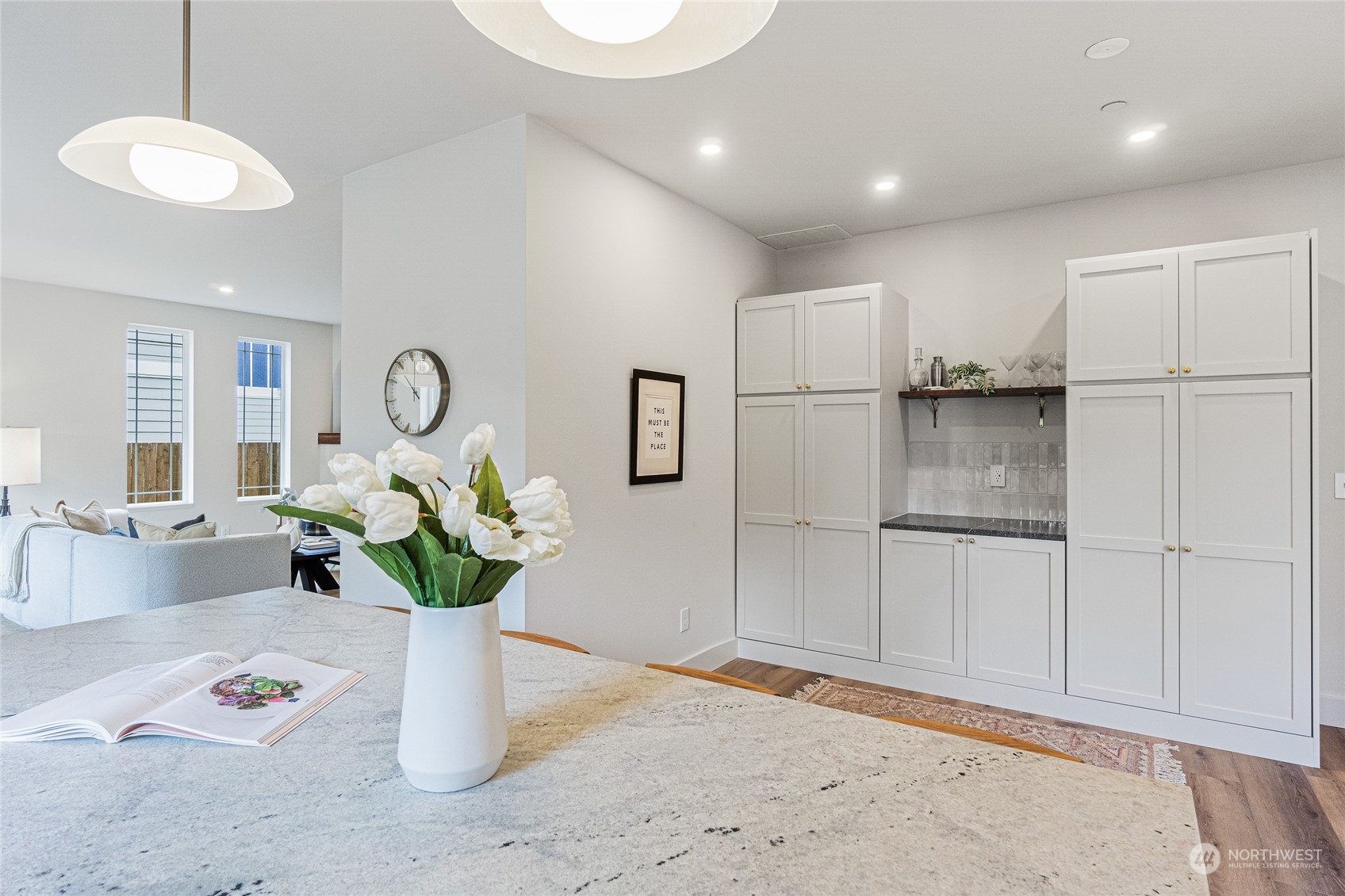 24310 13th Place West Bothell, WA 98021 - Photo 19 of 35 a view of kitchen and living room