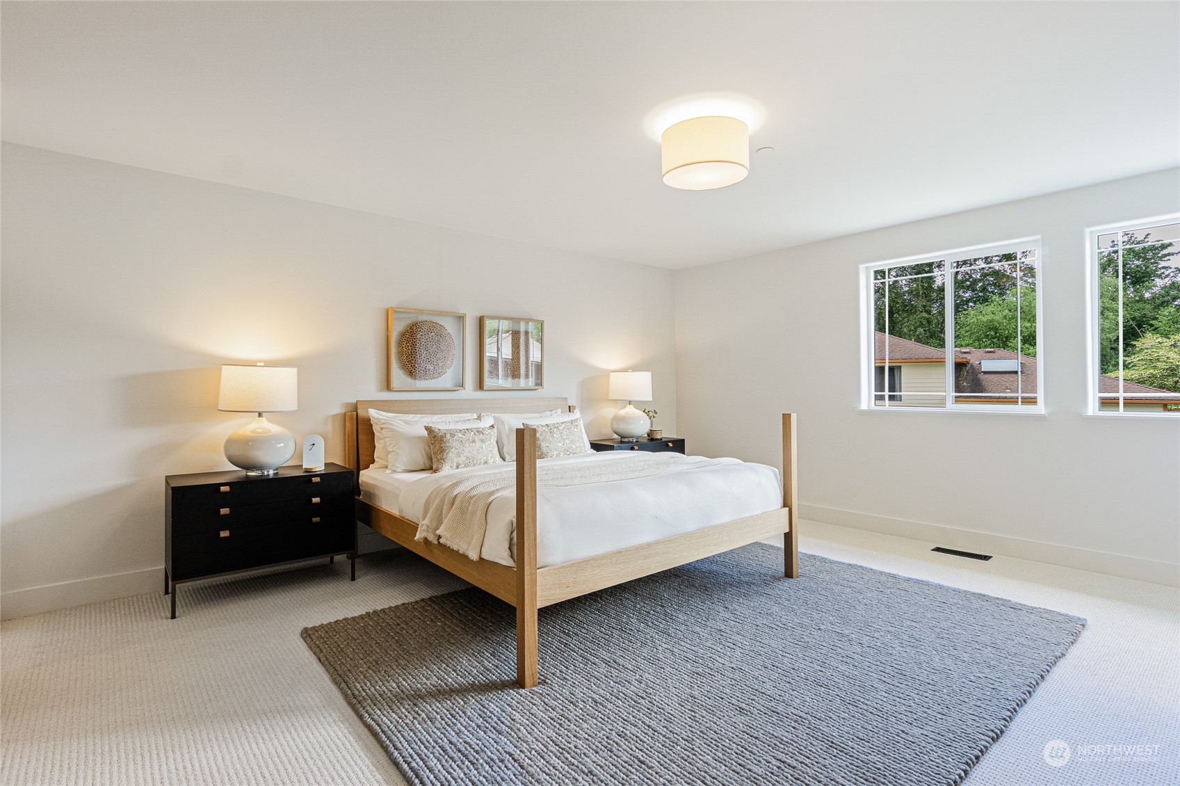 24310 13th Place West Bothell, WA 98021 - Photo 27 of 35 a bed room with a bed and a couch