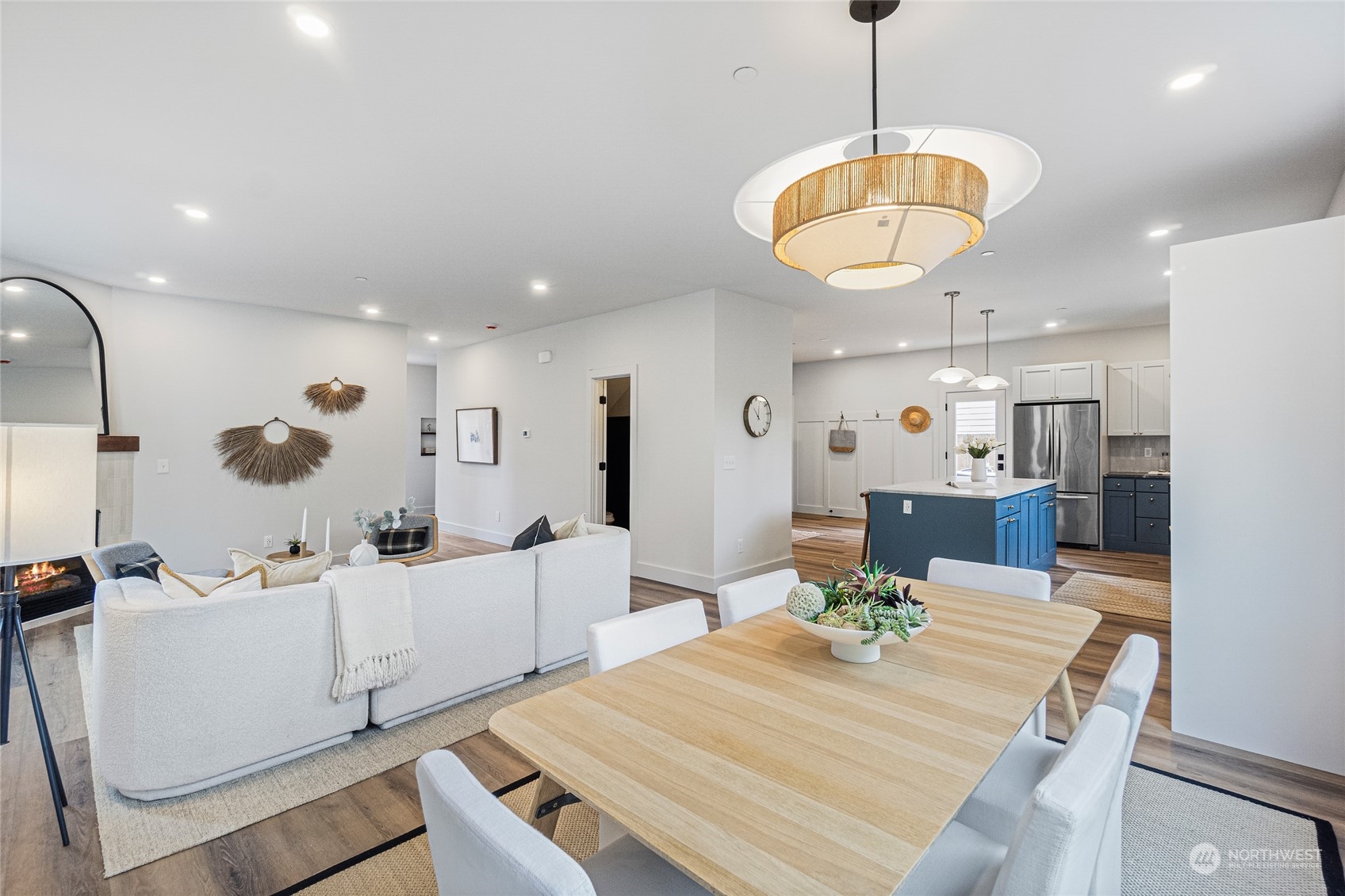 24310 13th Place West Bothell, WA 98021 - Photo 9 of 35 a large kitchen with a table and chairs
