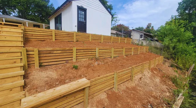 a view of a backyard with sitting area