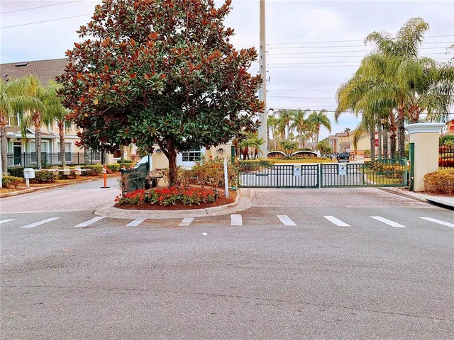 a view of outdoor space with palm trees