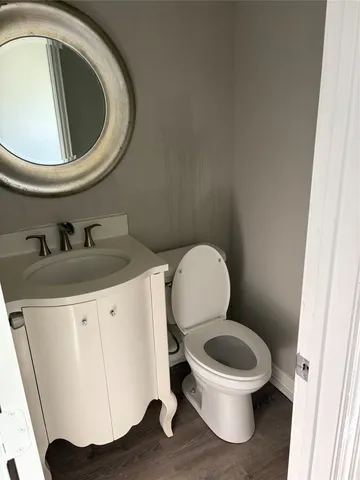 a bathroom with a toilet and a sink