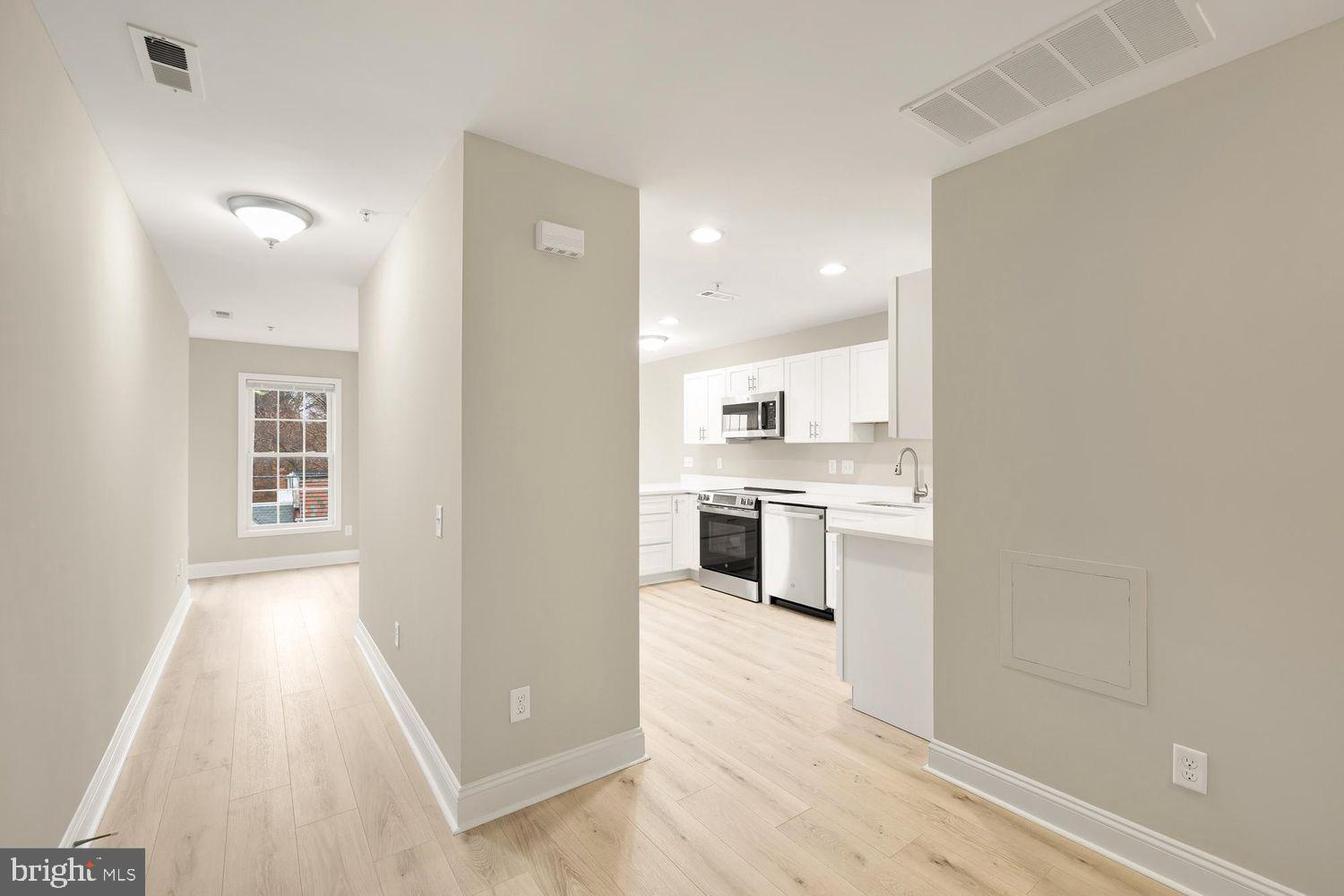 1753 W Street Southeast, Unit C Washington, DC 20020 - Photo 5 of 29 a view of kitchen with wooden floor