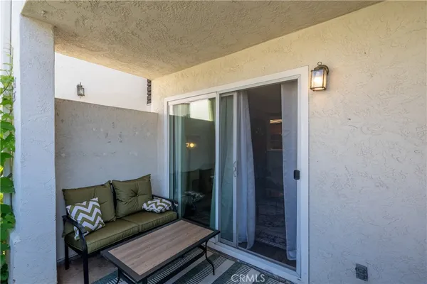 a living room with furniture and a gate