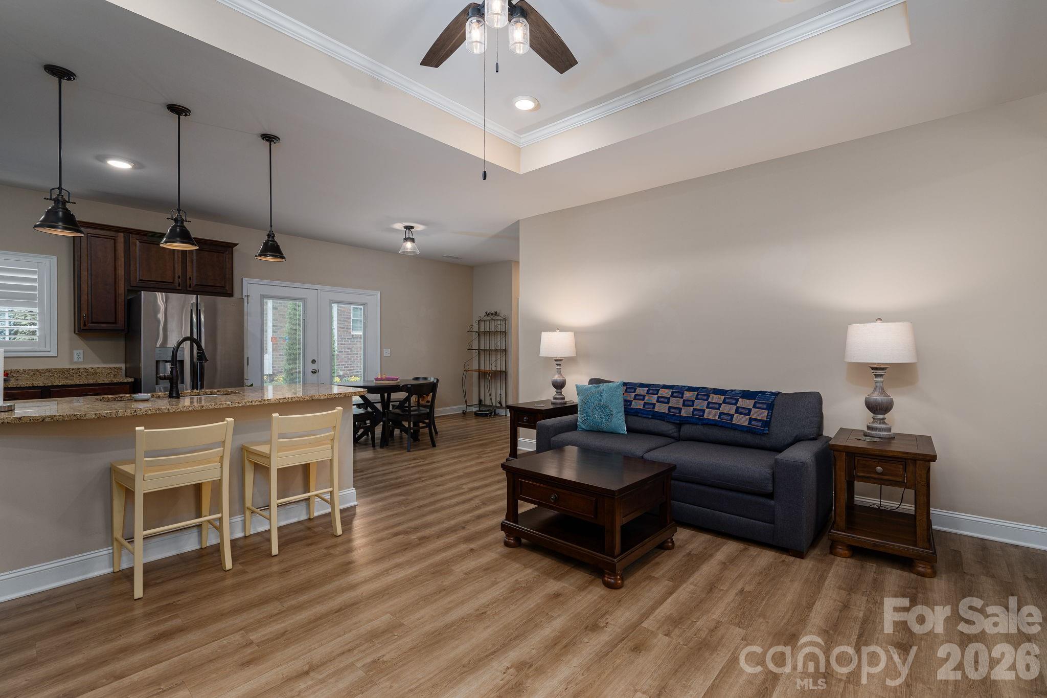 201-t R T R Harris Drive Shelby, NC 28150 - Photo 11 of 25 a living room with furniture and a wooden floor