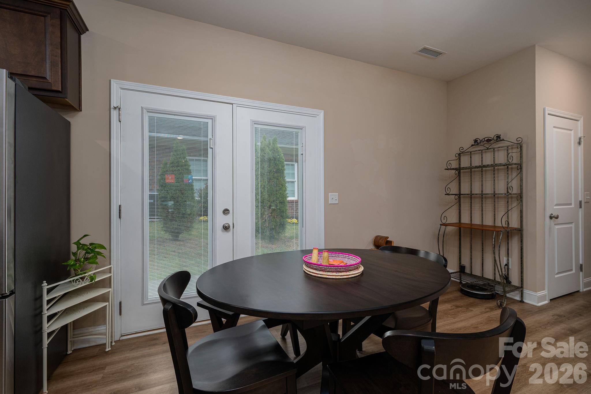 201-t R T R Harris Drive Shelby, NC 28150 - Photo 15 of 25 a view of a dining room with furniture and wooden floor