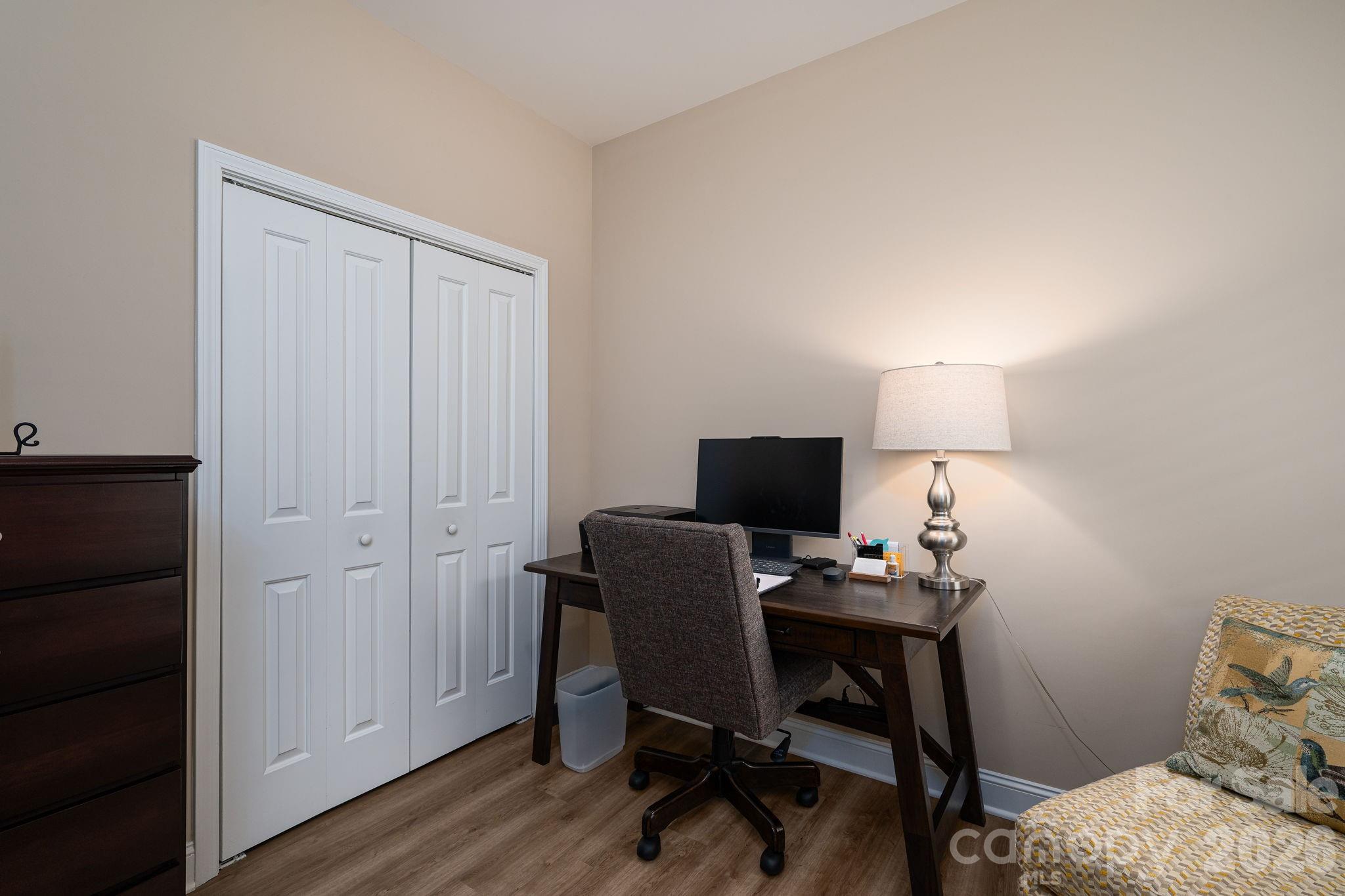 201-t R T R Harris Drive Shelby, NC 28150 - Photo 20 of 25 a view of a workspace with furniture and wooden floor
