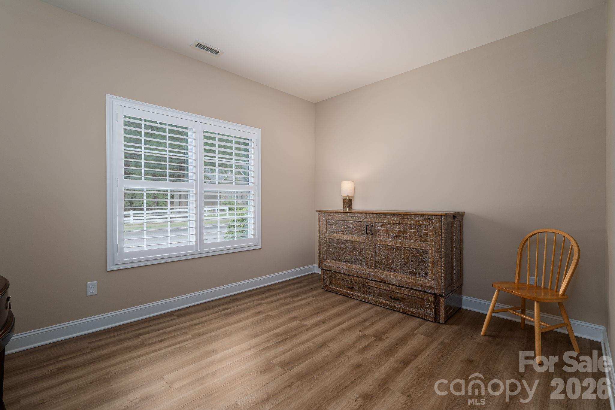 201-t R T R Harris Drive Shelby, NC 28150 - Photo 23 of 25 a room with a chair and a window