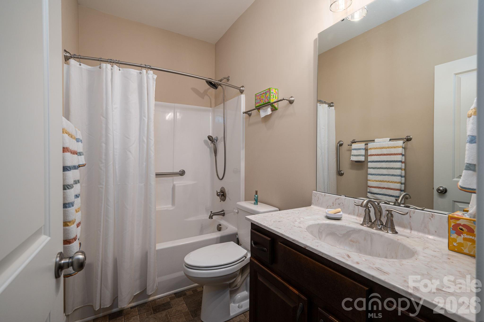 201-t R T R Harris Drive Shelby, NC 28150 - Photo 24 of 25 a bathroom with a granite countertop sink toilet and shower