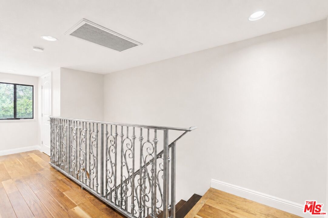 1114 Las Riendas Way Pasadena, CA 91107 - Photo 13 of 20 a view of hallway with wooden floor