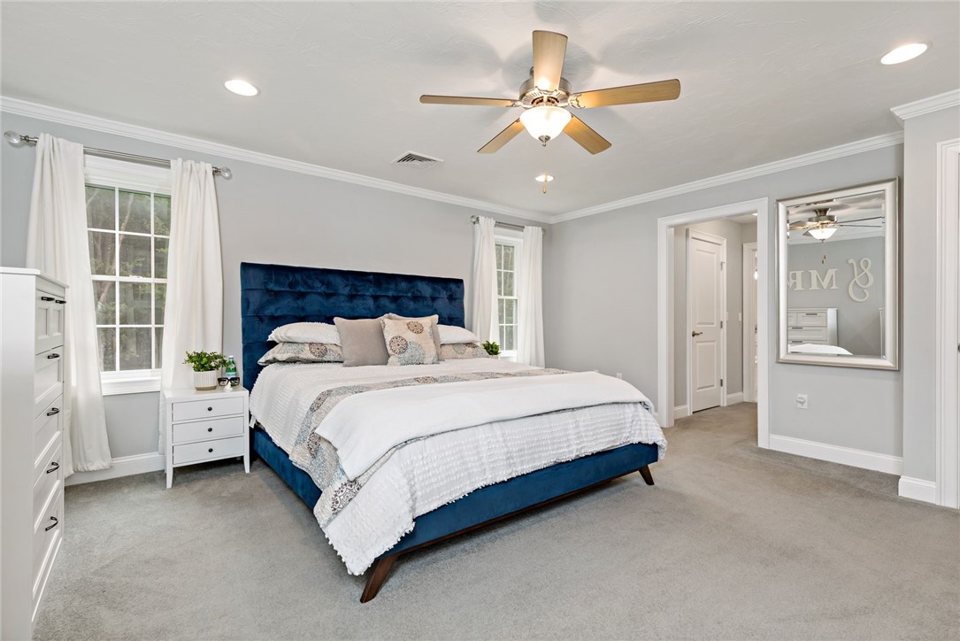 44 Lantern Road Lincoln, RI 02865 - Photo 32 of 50 Primary bedroom with a walk-in closet, additional closet, and gorgeous and spacious en-suite bathroom.