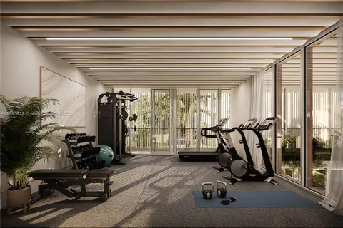 a view of a room with gym equipment