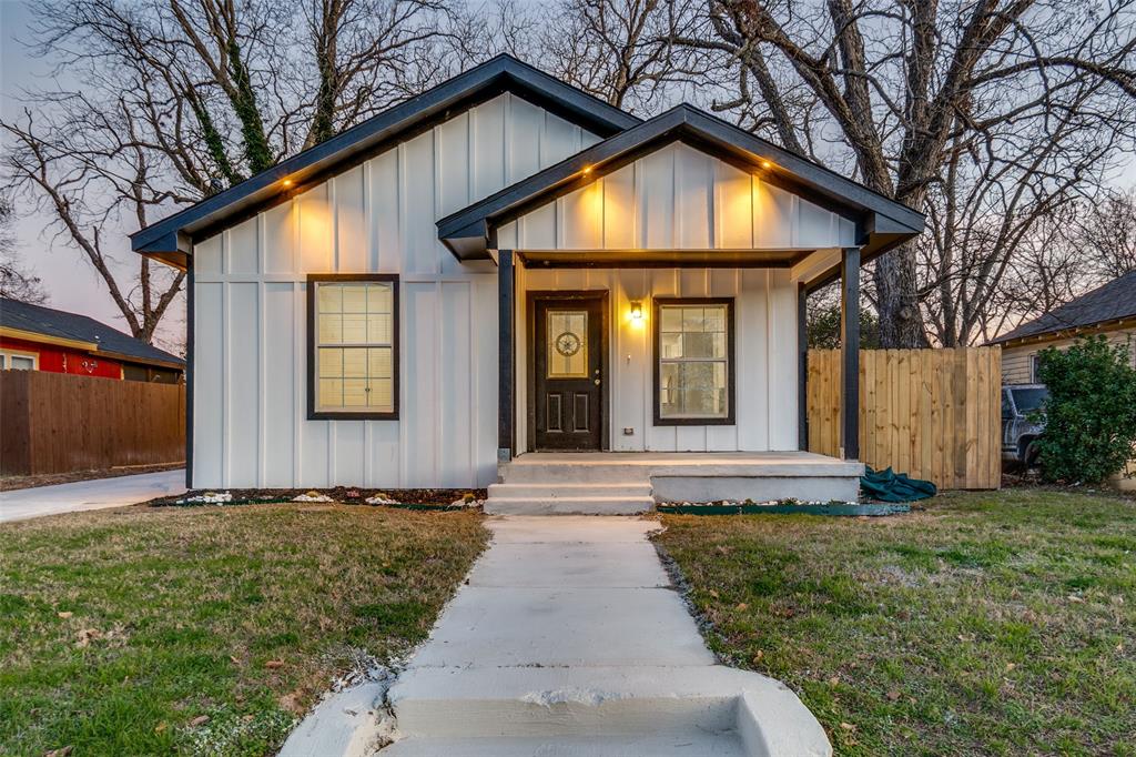 a front view of house with yard
