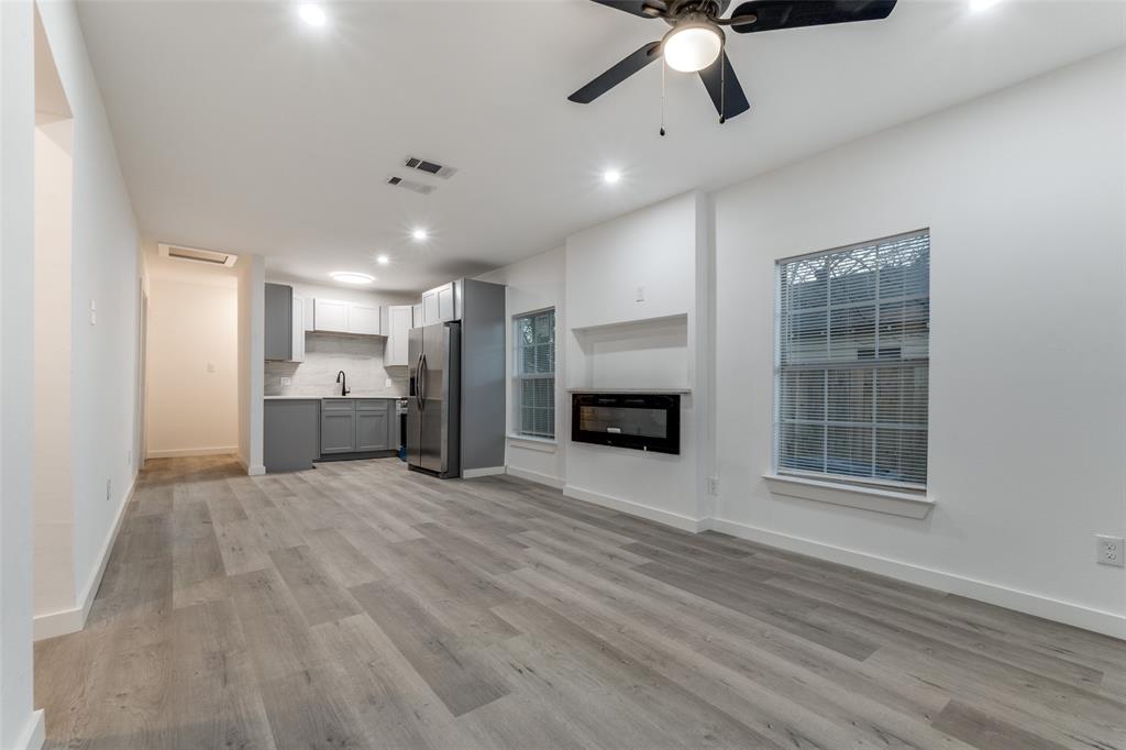 3242 Pine Street Dallas, TX 75215 - Photo 6 of 25 a view of kitchen and kitchen with furniture oven ceiling fan and window