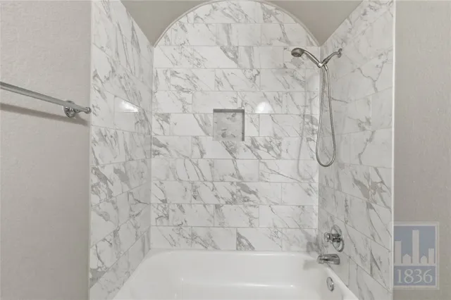 a bathroom with a bathtub