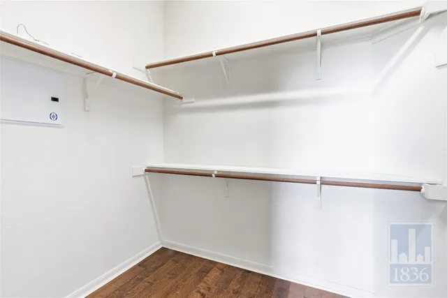 a view of a room with racks on the wall