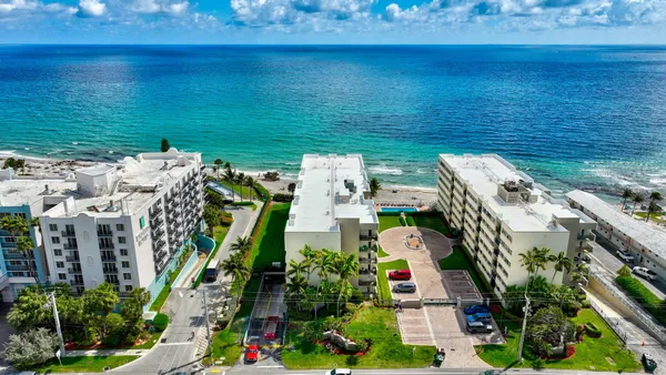 a view of a city with an ocean