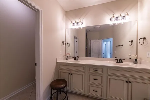 a view of a two chairs in the patio