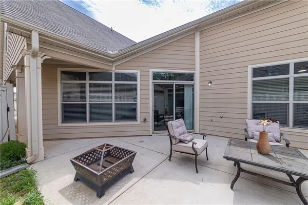 a view of outdoor space with signage and flags
