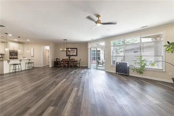 a dining room with furniture window wooden floor
