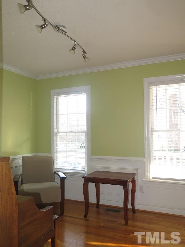 4441 Emmit Drive Raleigh, NC 27604 - Photo 3 of 19 a room with furniture and a window