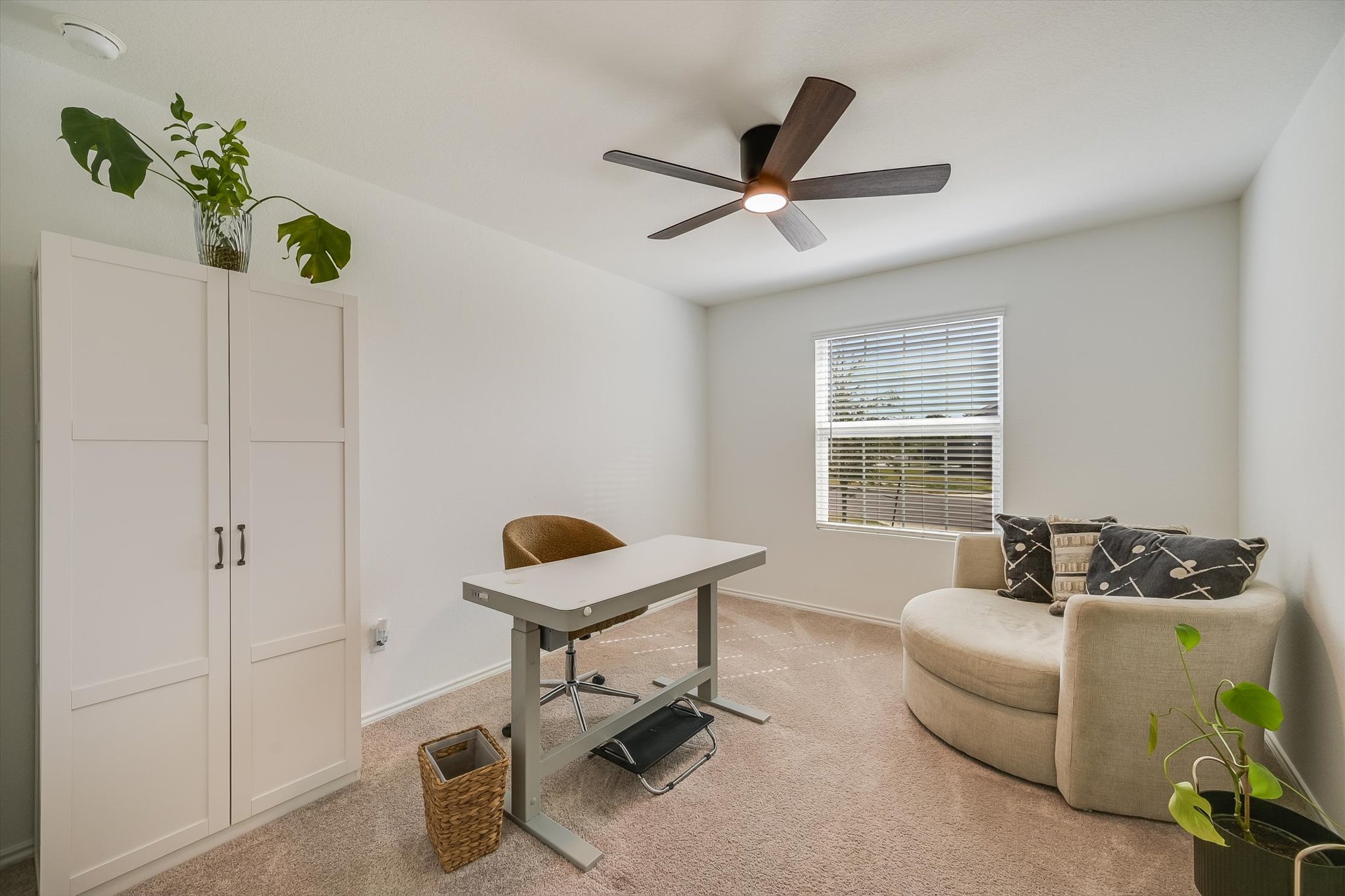 1701 Chapel Ranch Road Georgetown, TX 78628 - Photo 13 of 28 A single window illuminates the soft carpeting and smooth walls of this versatile space.