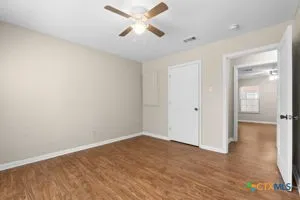 a bathroom with a sink a toilet and bathtub