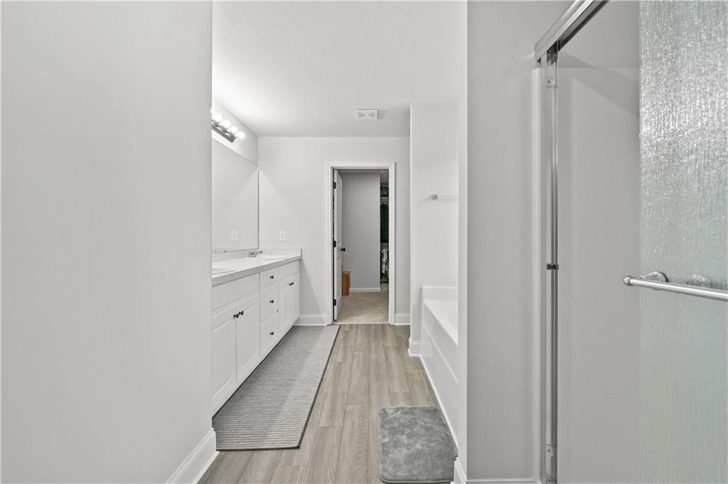 68 Suwannee Way Jefferson, GA 30549 - Photo 22 of 28 a view of a hallway with white walls
